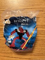 Front of sealed LEGO Bionicle Barraki Happy Meal toy polybag showing figure image and logos
