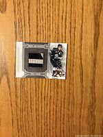 front of Emile Poirier Heroes and Prospects jersey card showing jersey swatch and player image