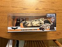 Front view of sealed Metals Die Cast The Dark Knight Batmobile & Batman set