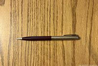 Full view of Parker 51 mechanical pencil with brown barrel and metal cap