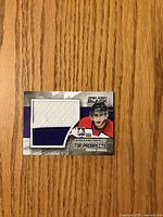 Front view of Quinton Howden Jumbo Jersey trading card displaying jersey patch and player image