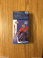Back of sealed Kraft Dinner box showing Patrick Roy hockey card.