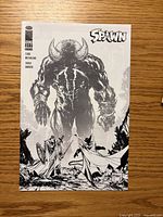 Front cover showing Spawn #317 with Image Comics logo, creator credits, monochrome art
