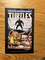 Front cover of TMNT #55 showing title, artwork, pricing, issue number, date.