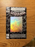 Front cover showing 30th Anniversary hologram artwork and issue details