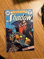 Front cover of The Shadow No. 4 comic showing title, issue number, month, price and artwork