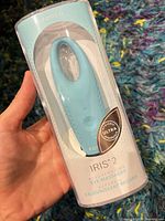Front of sealed FOREO IRIS 2 eye massager in clear package