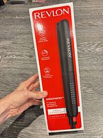 Front of sealed retail box showing product image and branding