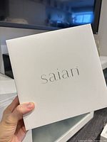 Outer white Saian branded box front