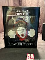 Front cover of Carnaval Perpetuel art book with dust jacket