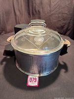 Full view of casserole with lid showing size and handles