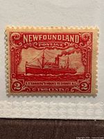 Front view of 1928 Newfoundland 2c deep carmine S.S. Caribou stamp