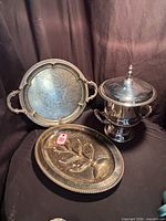 Overall view showing bucket with lid, round tray, oval platter