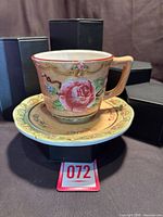 Cup on saucer showing main floral design