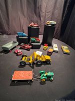 Group shot of all die-cast vehicles displayed on surface and risers