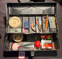 open tackle box with all contents visible