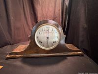 Front view of Sessions wooden mantel clock