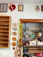 Wide shot showing multiple wall décor pieces hanging together