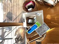 overview of stacked wicker and plastic pieces