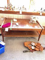 Full view of oak coffee table with shelf