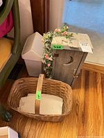 Basket, cubby cabinet and garland overall view