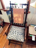 full front view of rocking chair with cushions