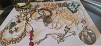 Overview of all jewellery pieces spread on table