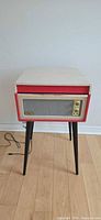 Front view of Crosley Dansette record player on legs