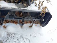 Front view showing twin augers and housing