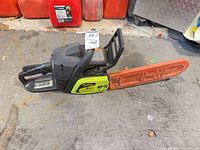 Left side view of Poulan chainsaw with Stihl bar cover attached