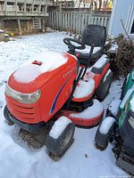 Full view of Simplicity riding mower in snow
