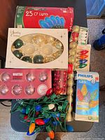 All lighting and ornament items laid out on table