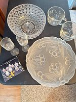 All items in lot displayed together on table