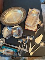 Group shot of all serveware and flatware on table