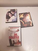 Front view of three DVD cases: Hope Floats, Ali, Dr. Dolittle