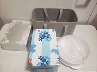 All four storage items shown together on table