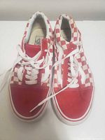 Top view of both sneakers showing red and white checkerboard pattern, laces, condition