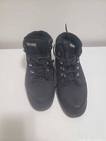 Pair of black Dry-Ice lace-up winter boots showing fronts and Thinsulate tongues