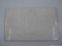 Front cover showing embossed 1960 and Cadillac crest
