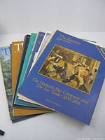 Stack of 14 The Beaver magazines with top cover showing blue special issue