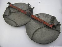 Scale laid flat showing painted beam, both trays and chains