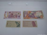 Front view of four banknotes