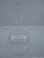 Front view showing full aerator with spiral tube and dome base