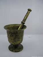 mortar with pestle resting inside