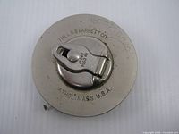 Front view showing maker’s marks and latch