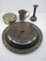 All four silver-plated pieces together for scale and completeness