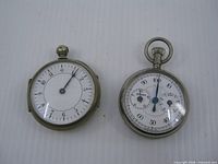 Front view of both pedometers showing dials and overall design