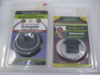 Both packaged Next Generation rechargeable magnetic therapy bracelets front view