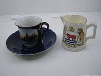 Cup, saucer and creamer full view