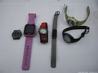 All six watches laid out side by side